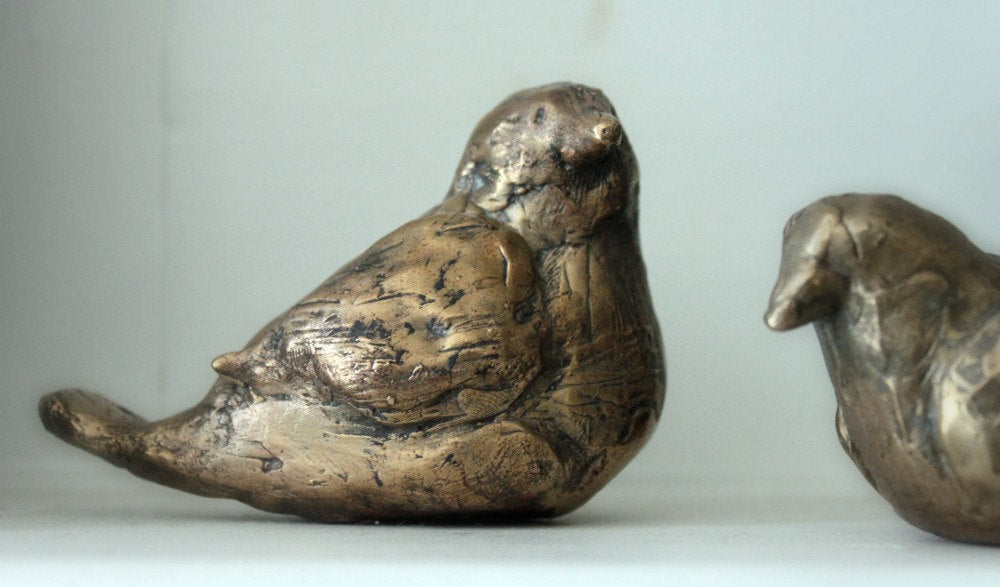 Bronze messenger birds